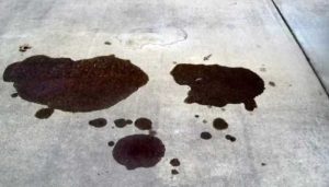 پاک کردن لکه روغن از کف پارکینگ ساختمان